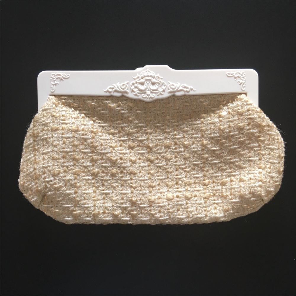 Make up bag, toiletries bag, clutch.